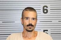 Flat Rock Man Arrested for Stabbing Son